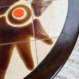 Round ceramic coffee table with “rooster” motif by Dan