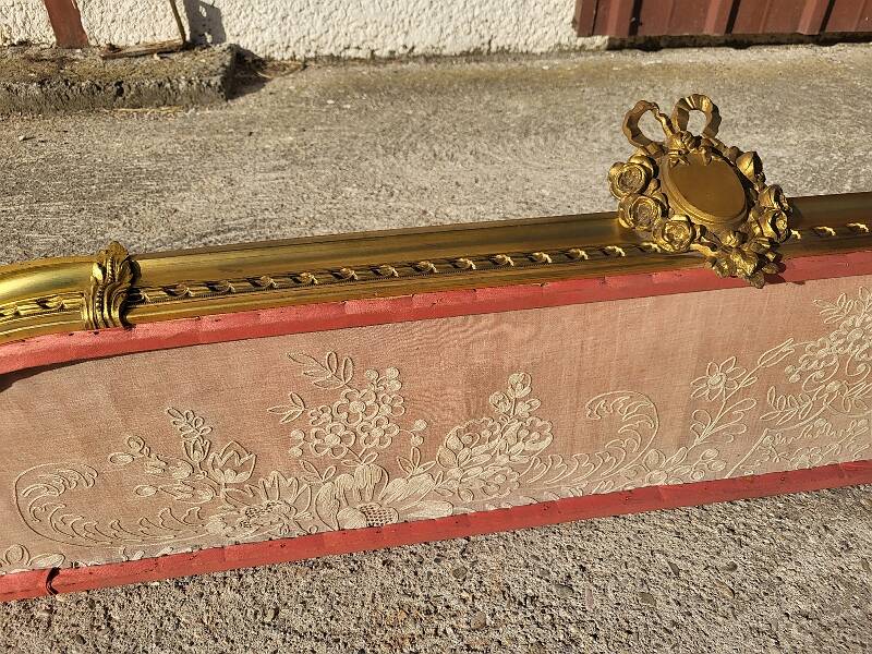 Old bed canopy in yellow copper and bronze