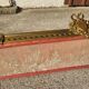Old bed canopy in yellow copper and bronze