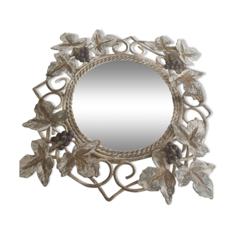 Wrought iron mirror. Grape leaf decoration.