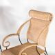 Pair of wicker and blackened iron armchairs