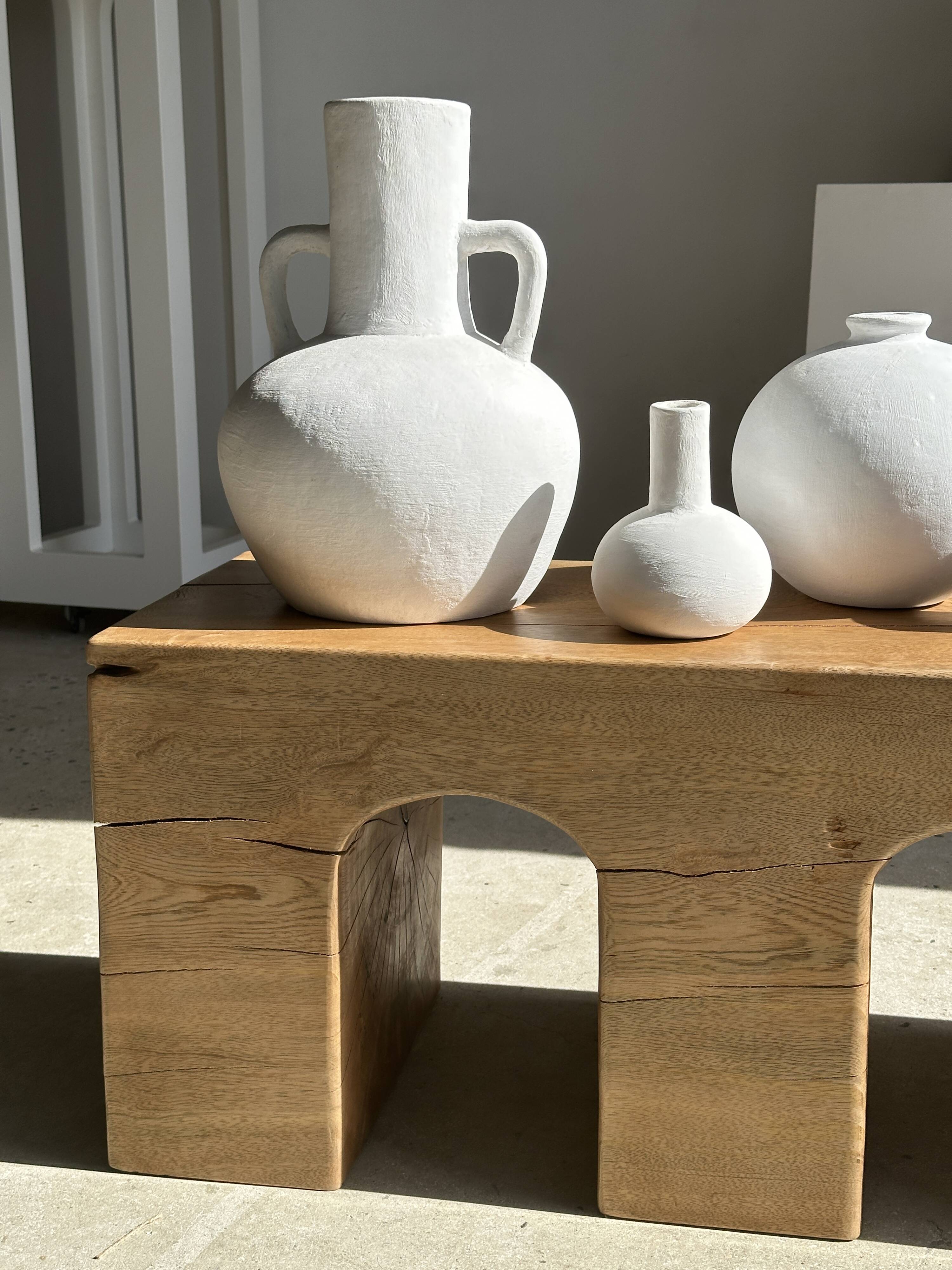 Solid monoxyl wood bench with carved 3-arch base - Natural wood color