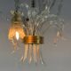 Asymmetrical Venetian chandelier in colourless and gold Murano glass, circa 1980.