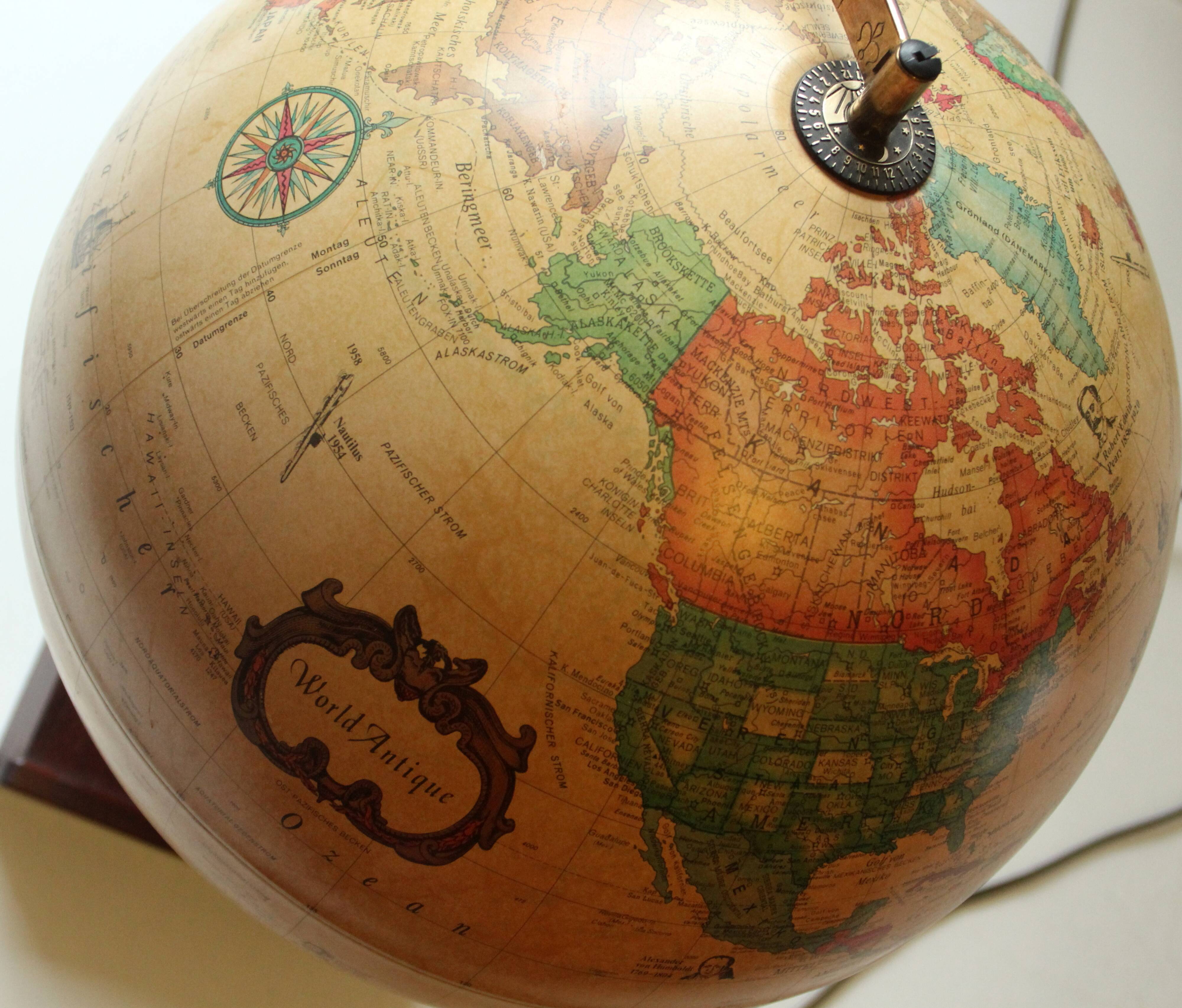1980s danish illuminated globe (Scan-Globe) on a wooden foot with weather station