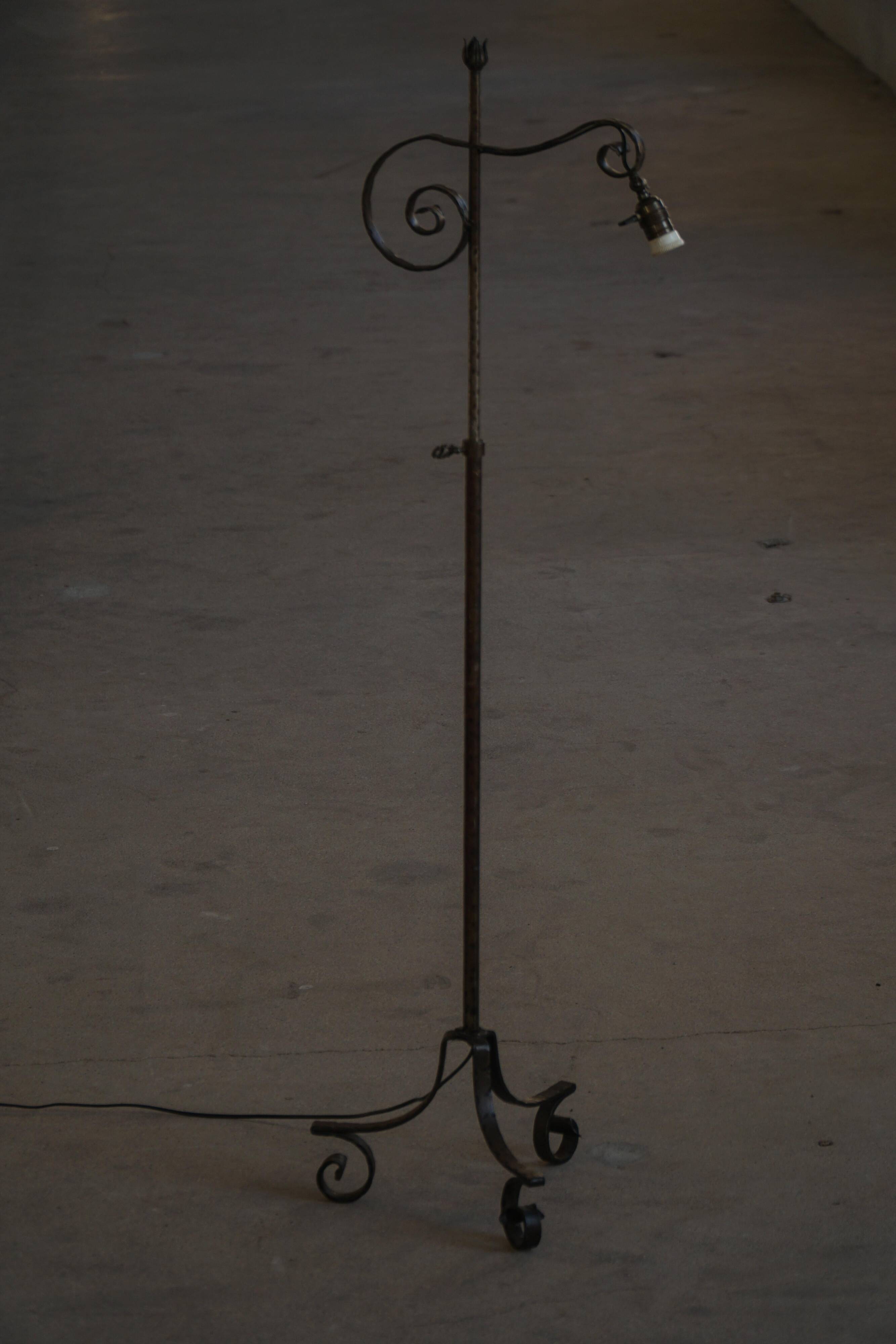 20th-century wrought iron floor lamp with swirling detail, Danish Art Deco.