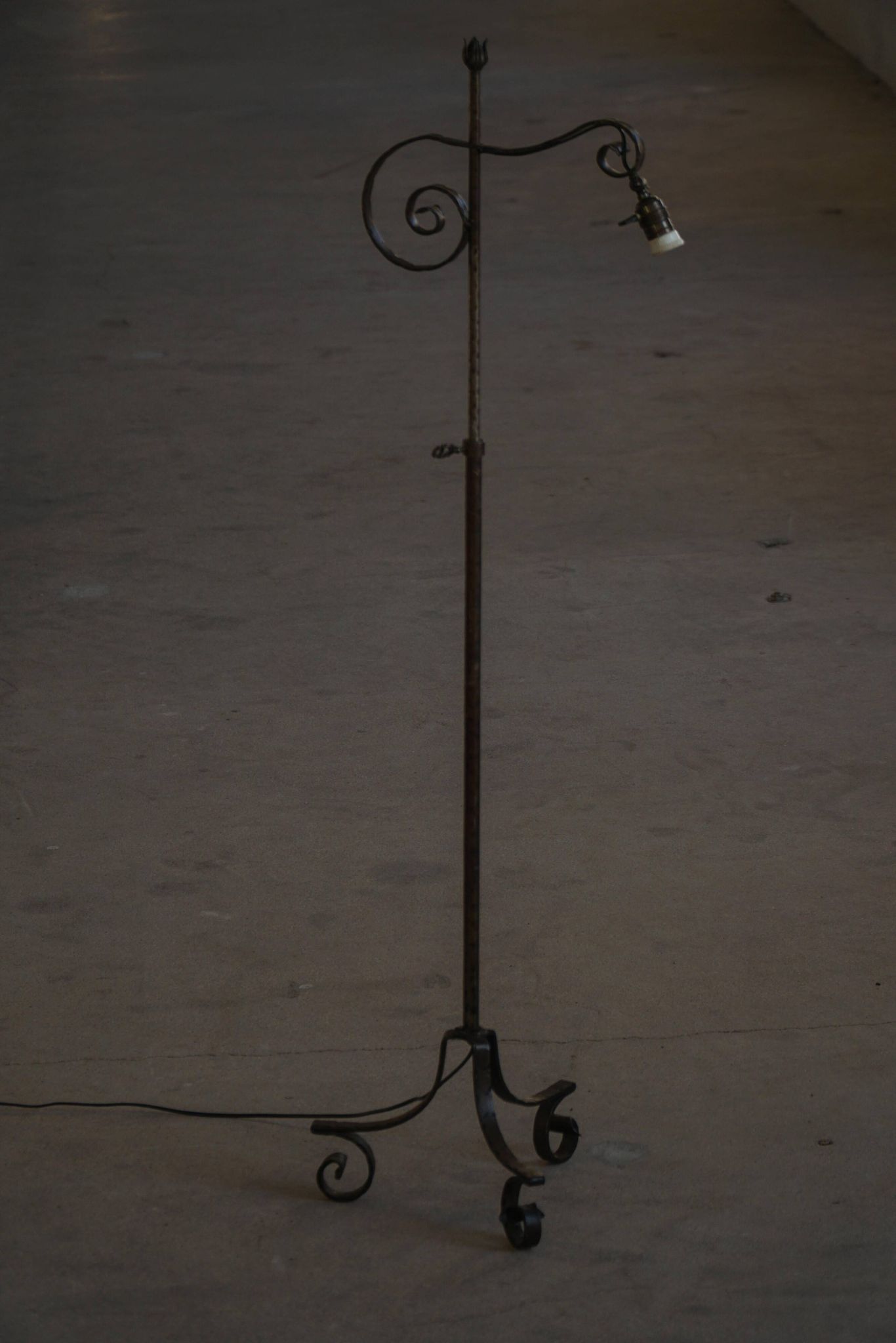 20th-century wrought iron floor lamp with swirling detail, Danish Art Deco.
