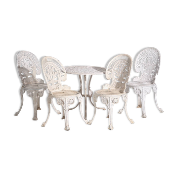Garden table and 4 chairs in Art Nouveau style, circa 1950.