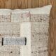 Old canvas cushion woven kilim style, patched