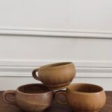 Three cups made of ancient sandstone