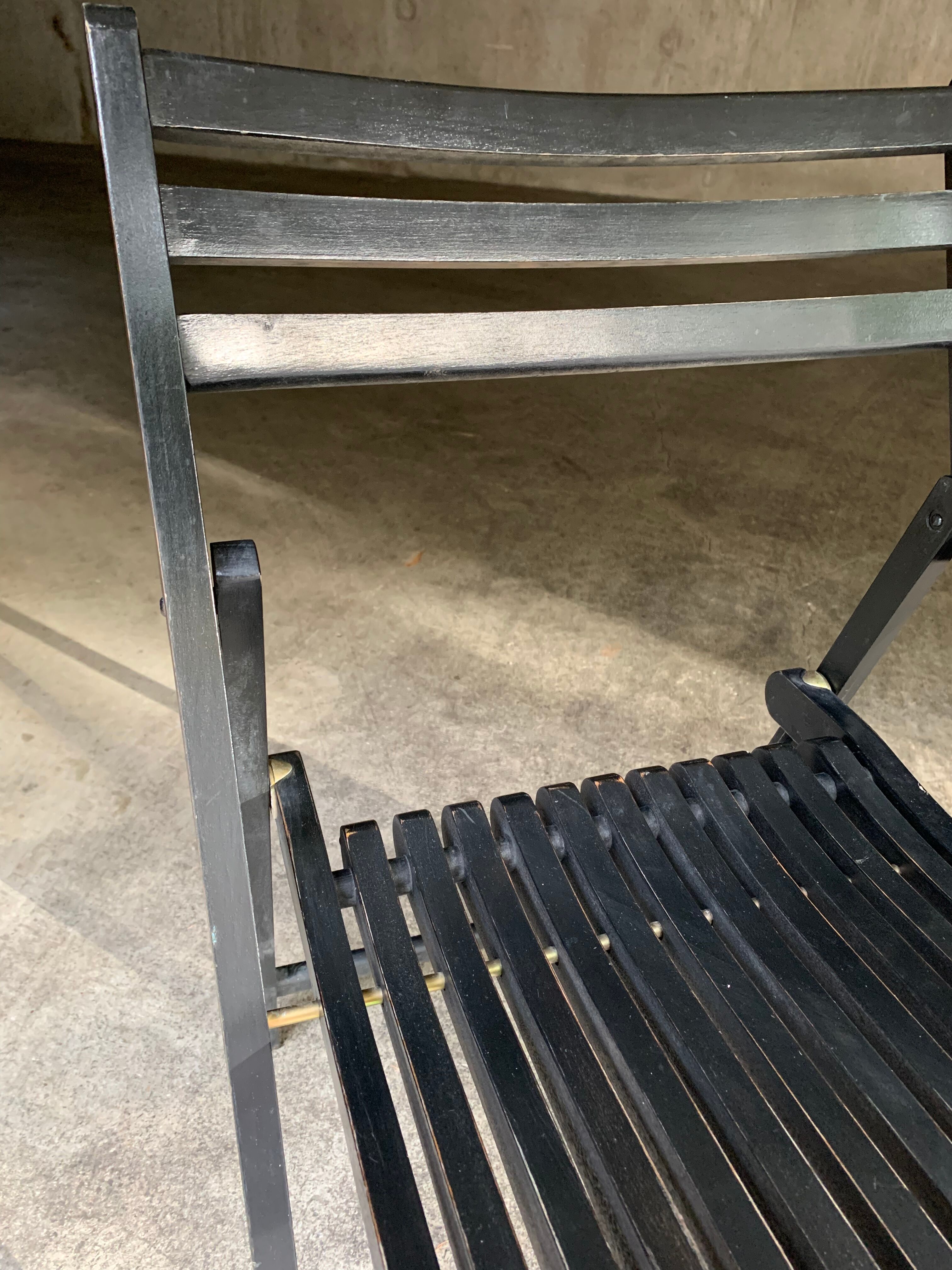 Pair of black folding chairs