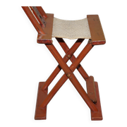 Antique Chinese folding chair with carvings, circa 1900-1920.
