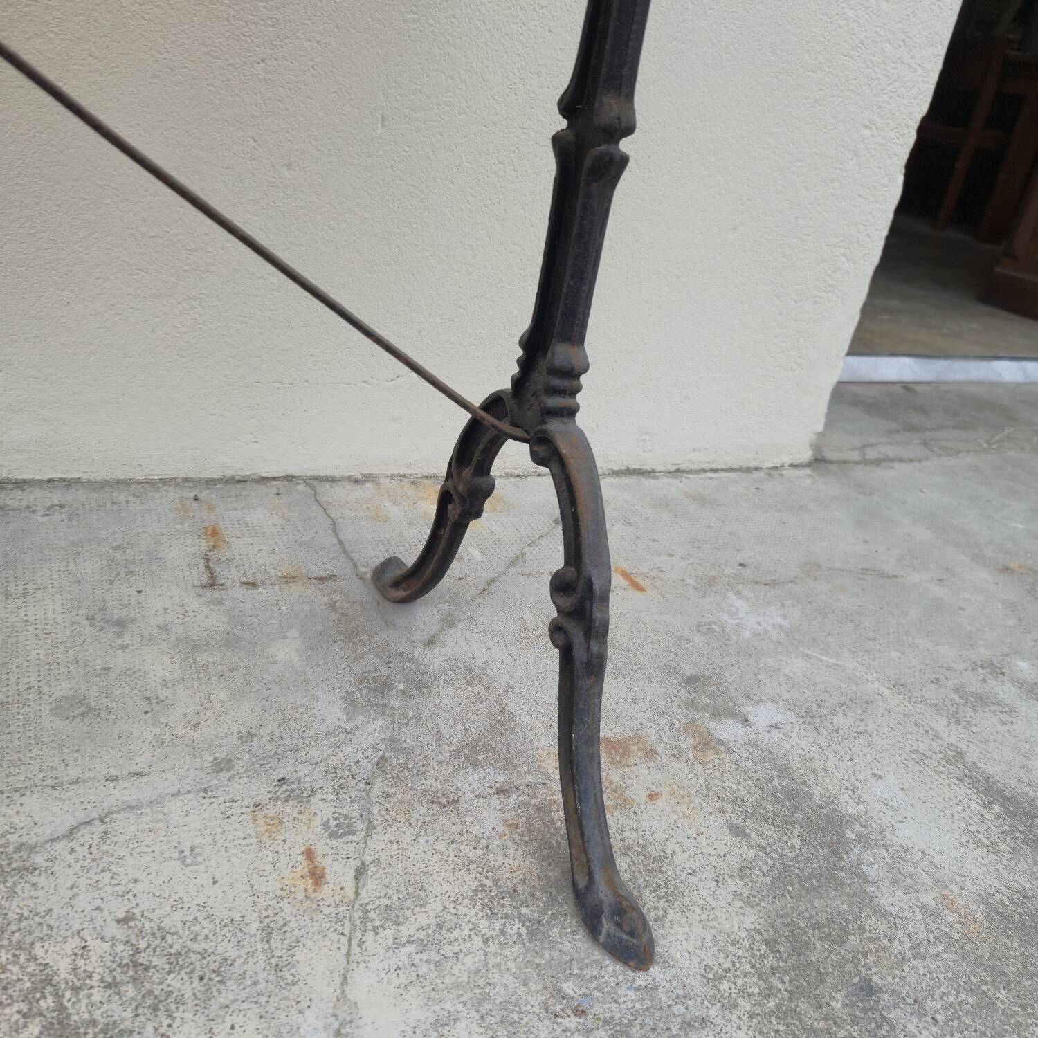 Antique cast iron and marble bistro restaurant table