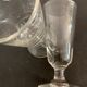 12 old glasses on foot at bistro or absinthe