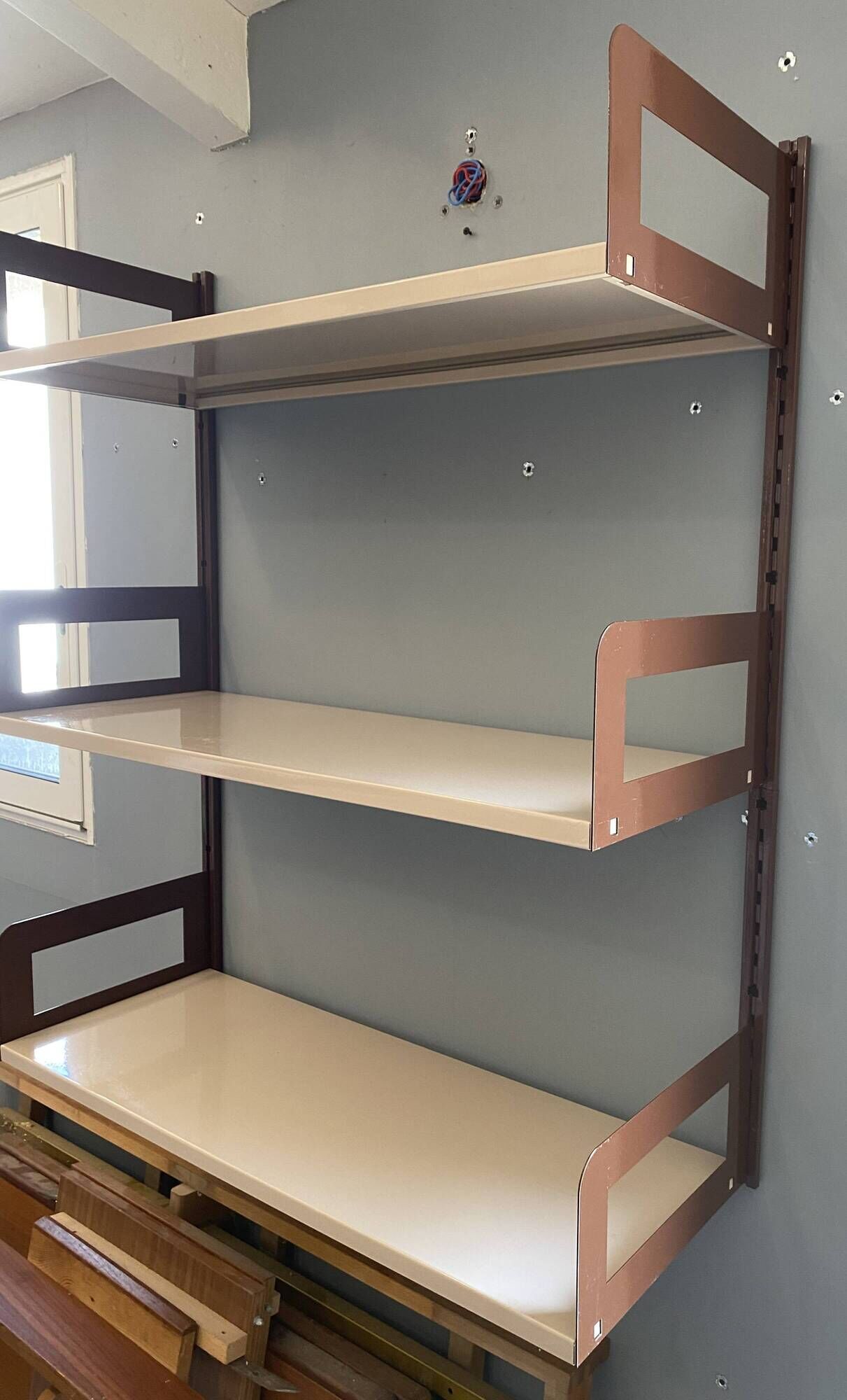 Modular metal wall shelf in brown and beige vintage 70s design.