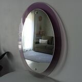 Vintage oval plexiglass mirror from the 70s by Harvey Guzzini