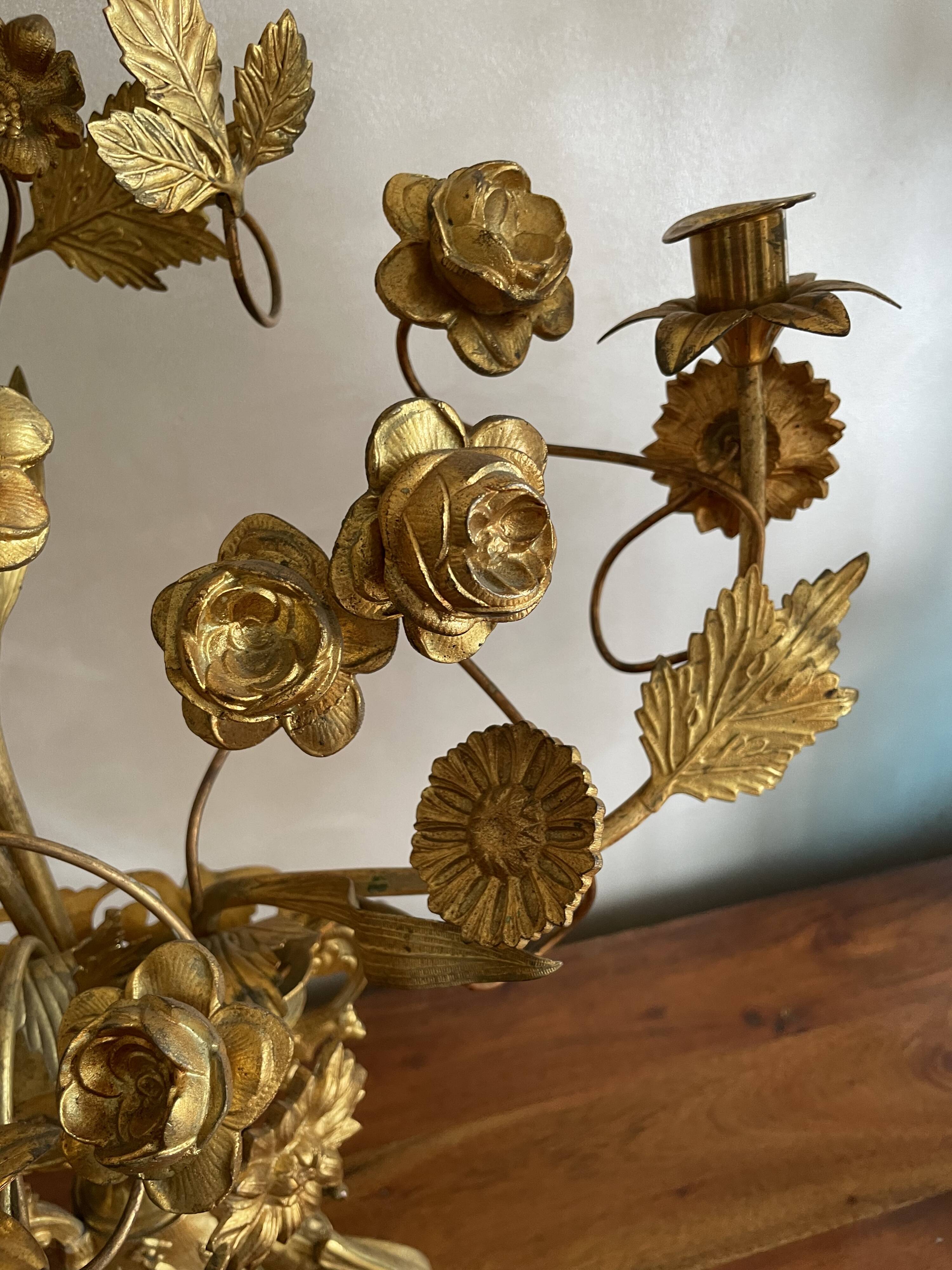 Brass church candelabra with fleur-de-lys