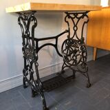 Ancient table, cast iron footing