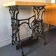 Ancient table, cast iron footing