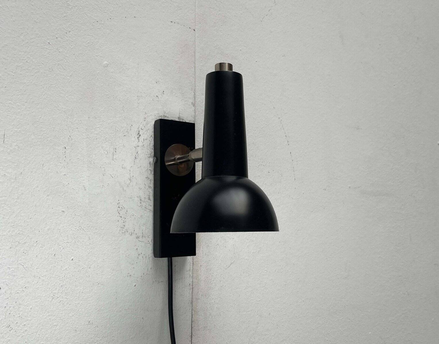Mid-century German black minimalist wall lamp by Hustadt, 1960s.
