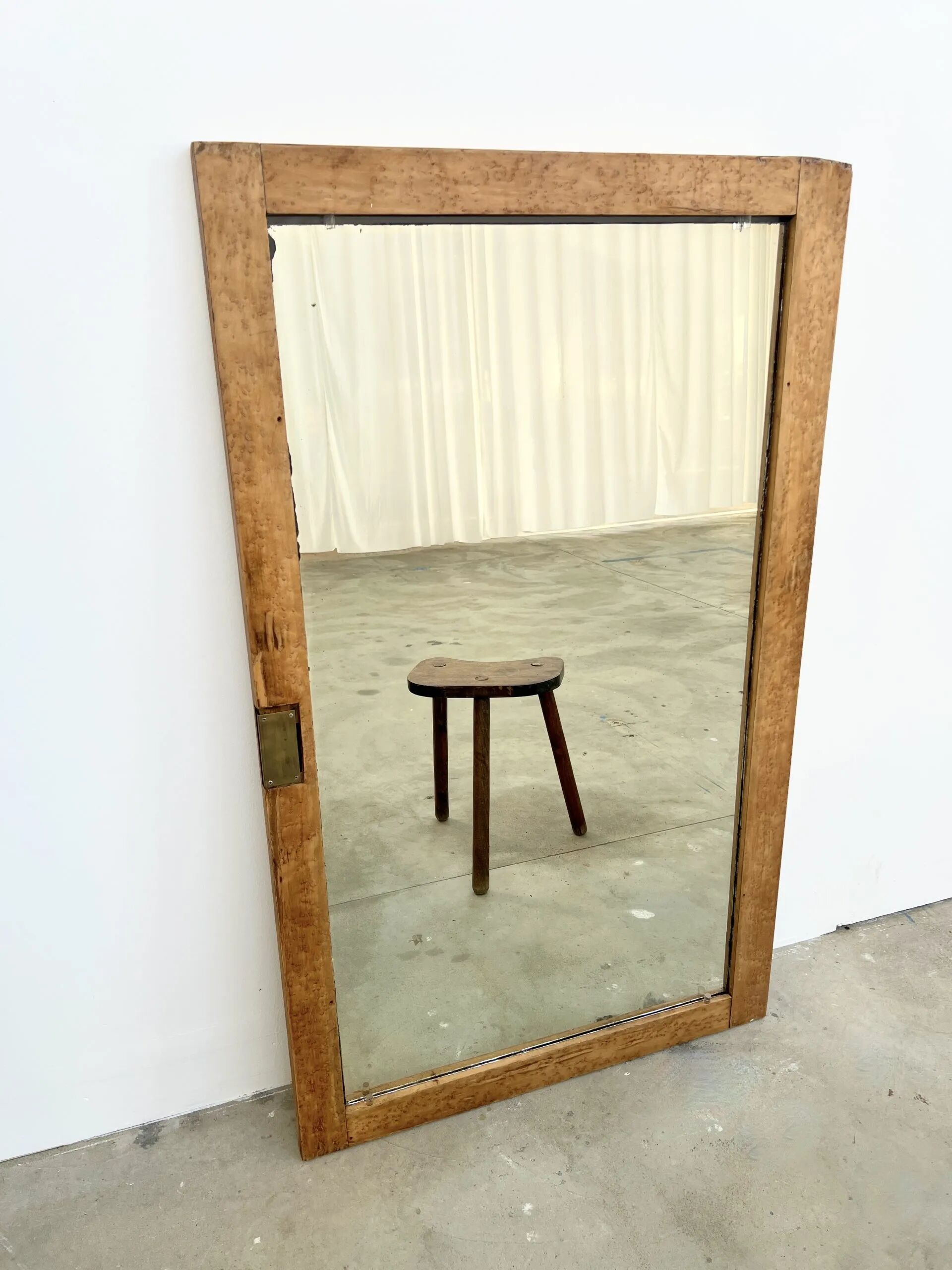 Antique mirror on an elm wardrobe door