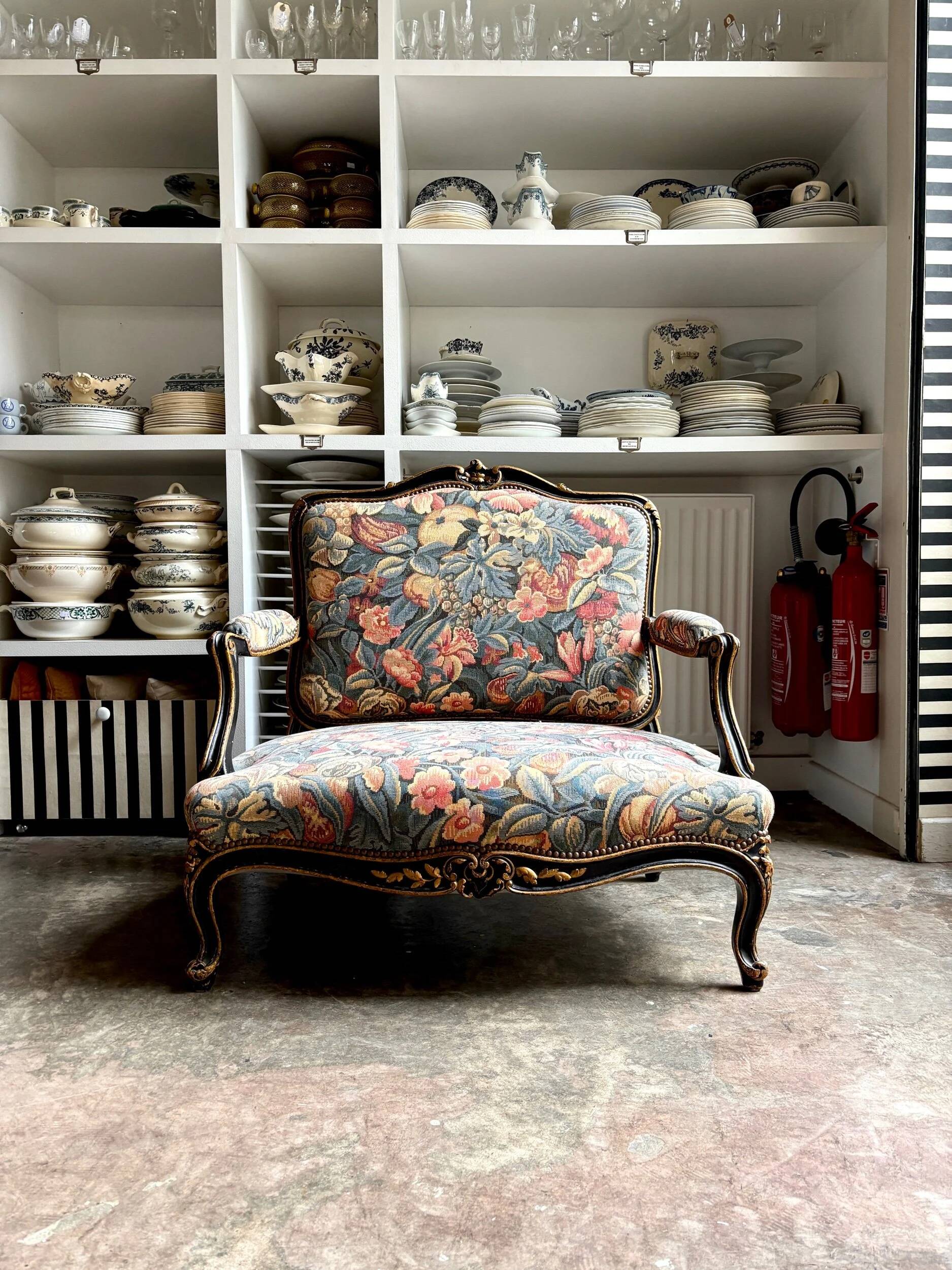 Louis XV style marquise in black and gold wood and jacquard, Napoléon III period.
