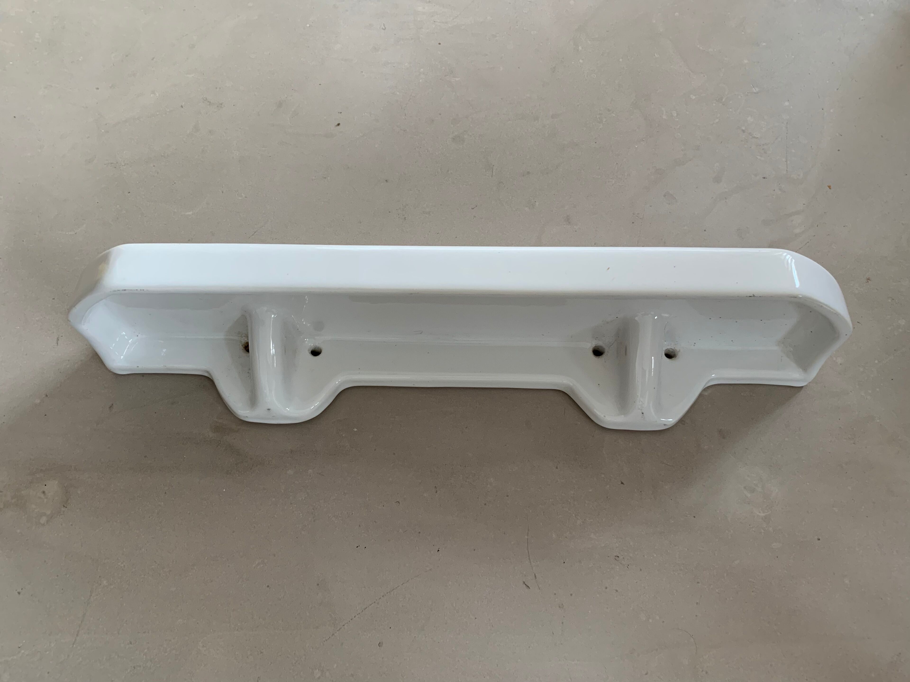 Antique ceramic wall shelf