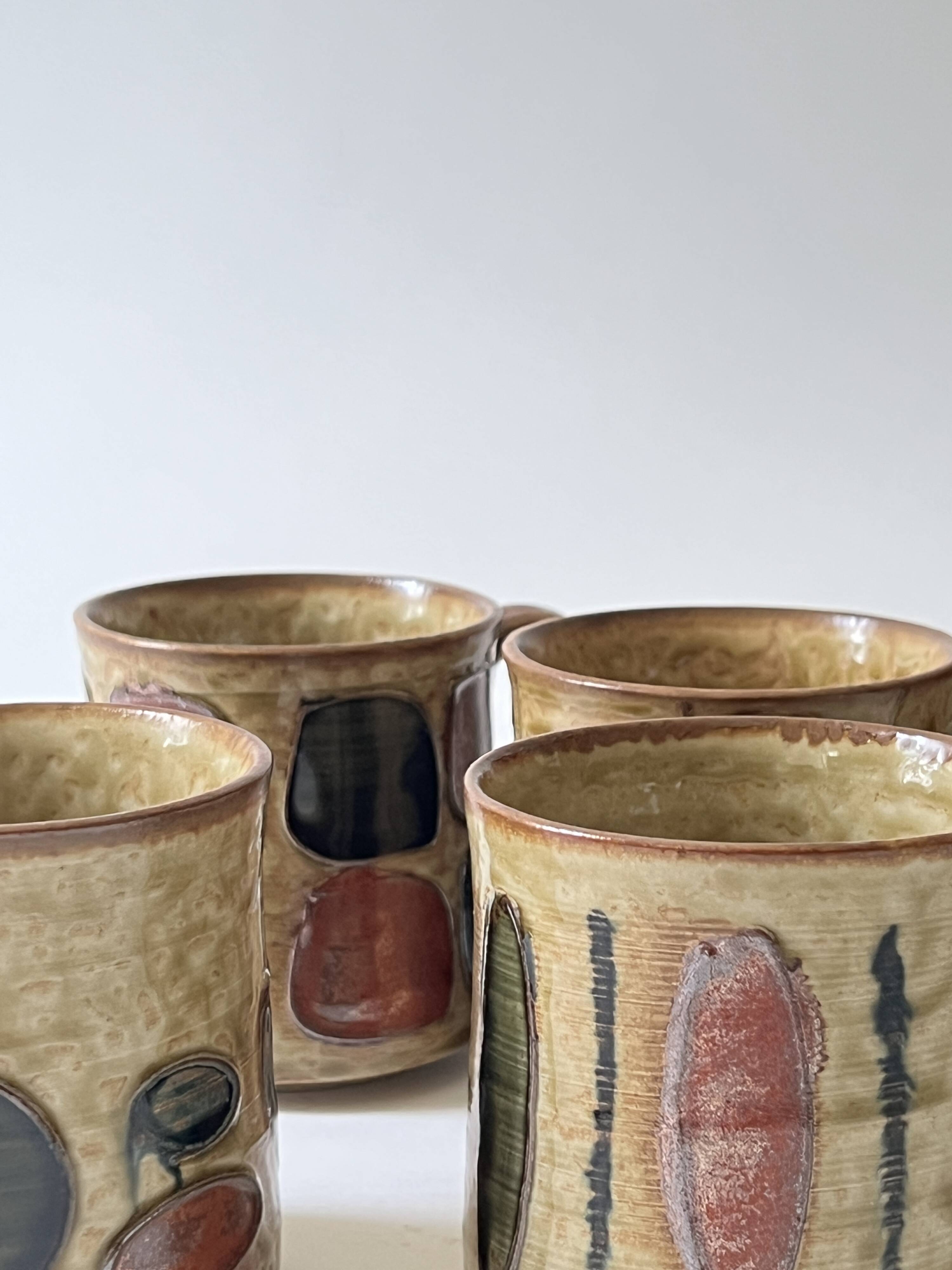 Set of 4 glazed ceramic coffee cups, circa 1970
