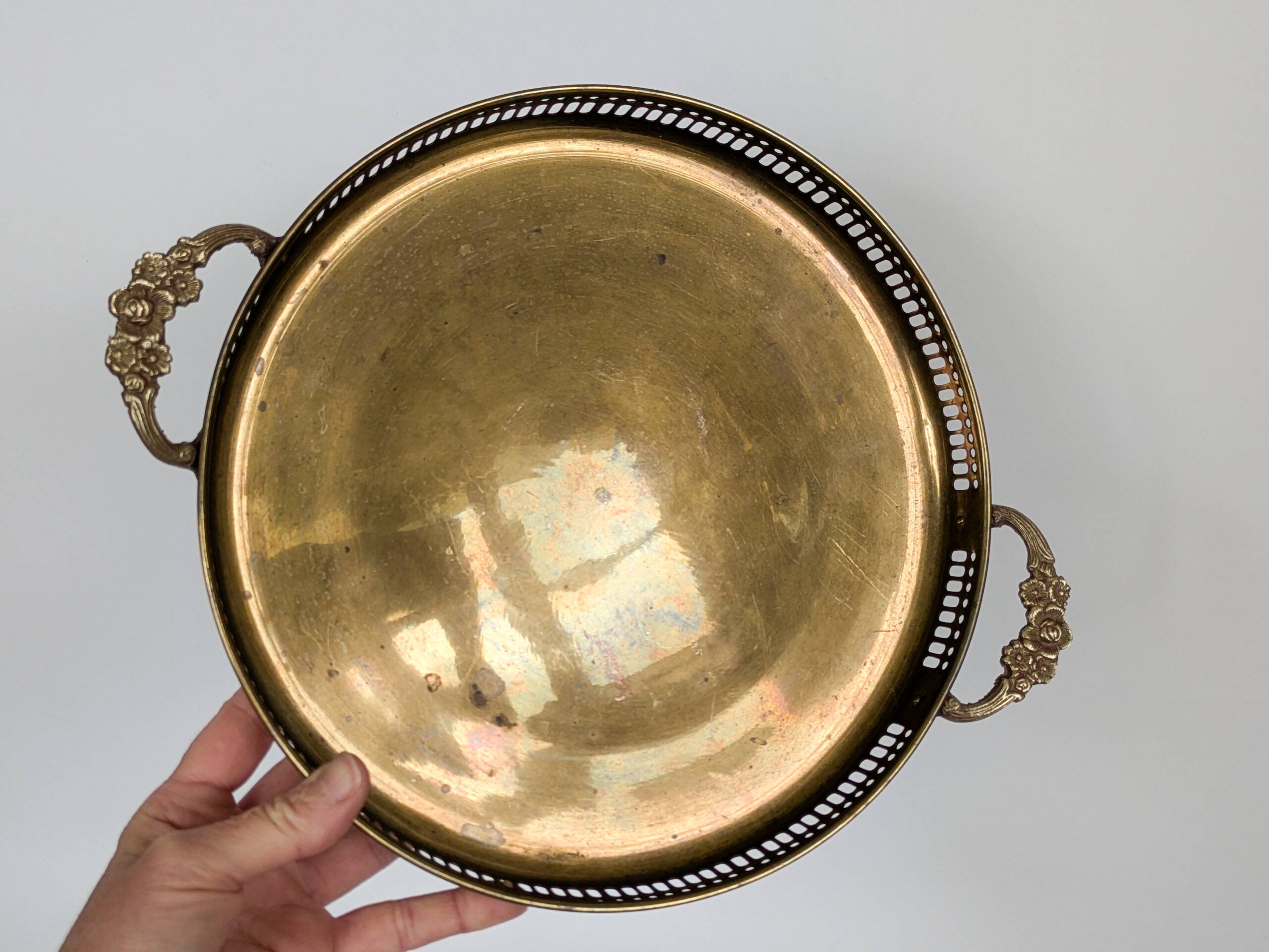 Vintage decorative brass tray, pierced edge and floral handles.