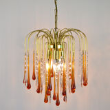A pair of Mid Century 70's waterfall chandeliers. Murano glass amber drops. Paolo Venini style.