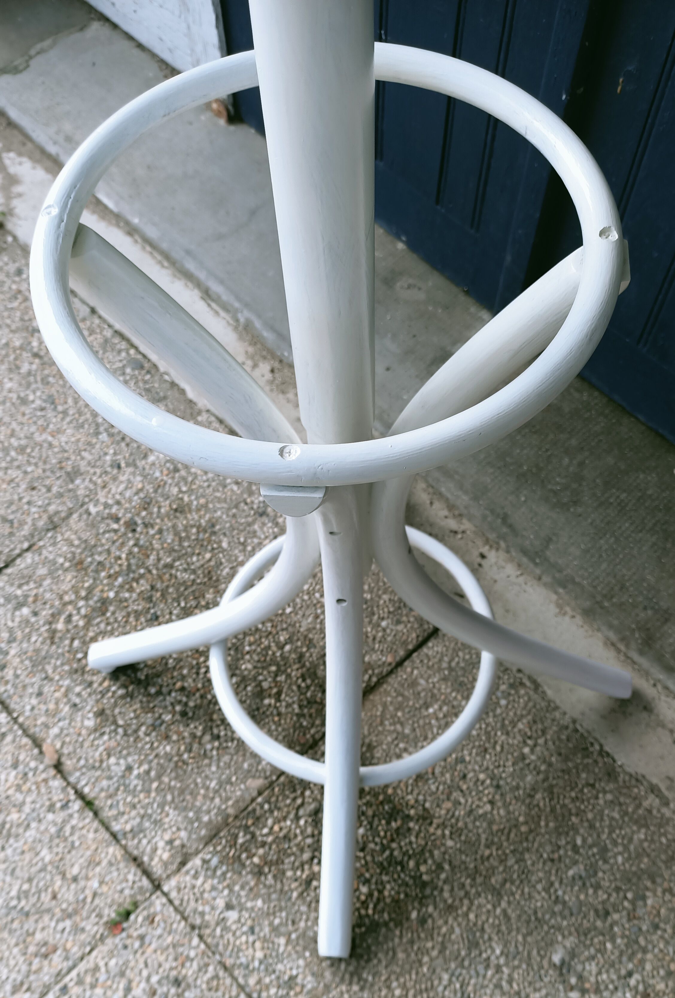 White parrot coat rack