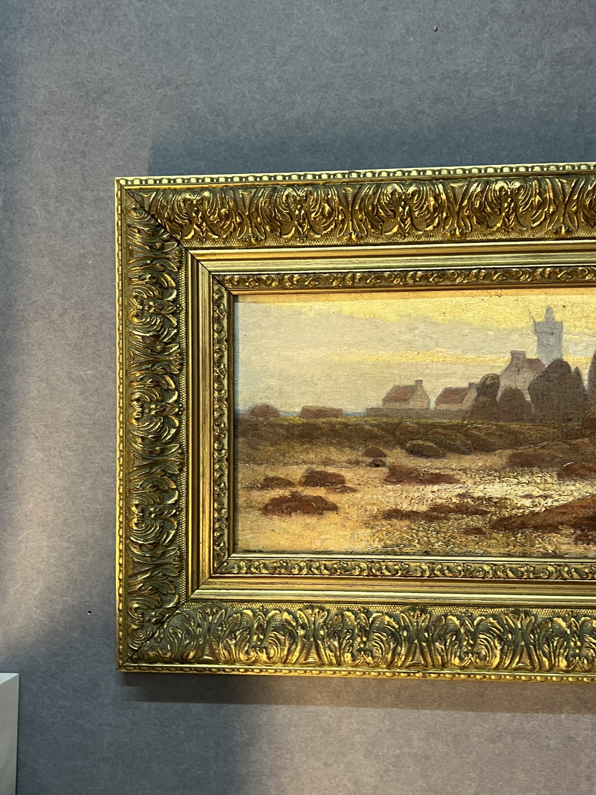 A. Laemmermann, oil painting on cardboard depicting a rocky landscape.