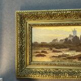 A. Laemmermann, oil painting on cardboard depicting a rocky landscape.