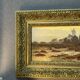 A. Laemmermann, oil painting on cardboard depicting a rocky landscape.