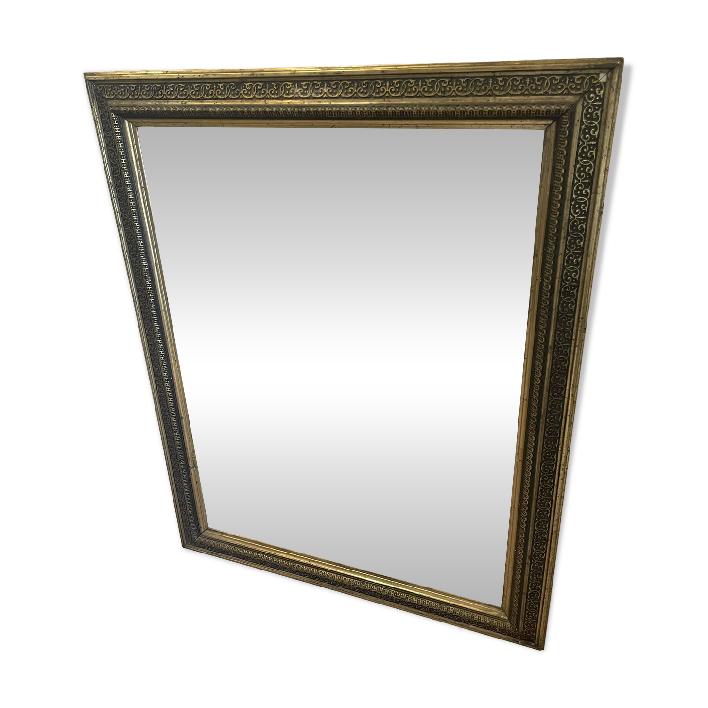 Large gilded antique mirror with moulding in the Napoléon III style.