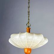 1960s Italian cocoon suspension, made of resin and pine wood.