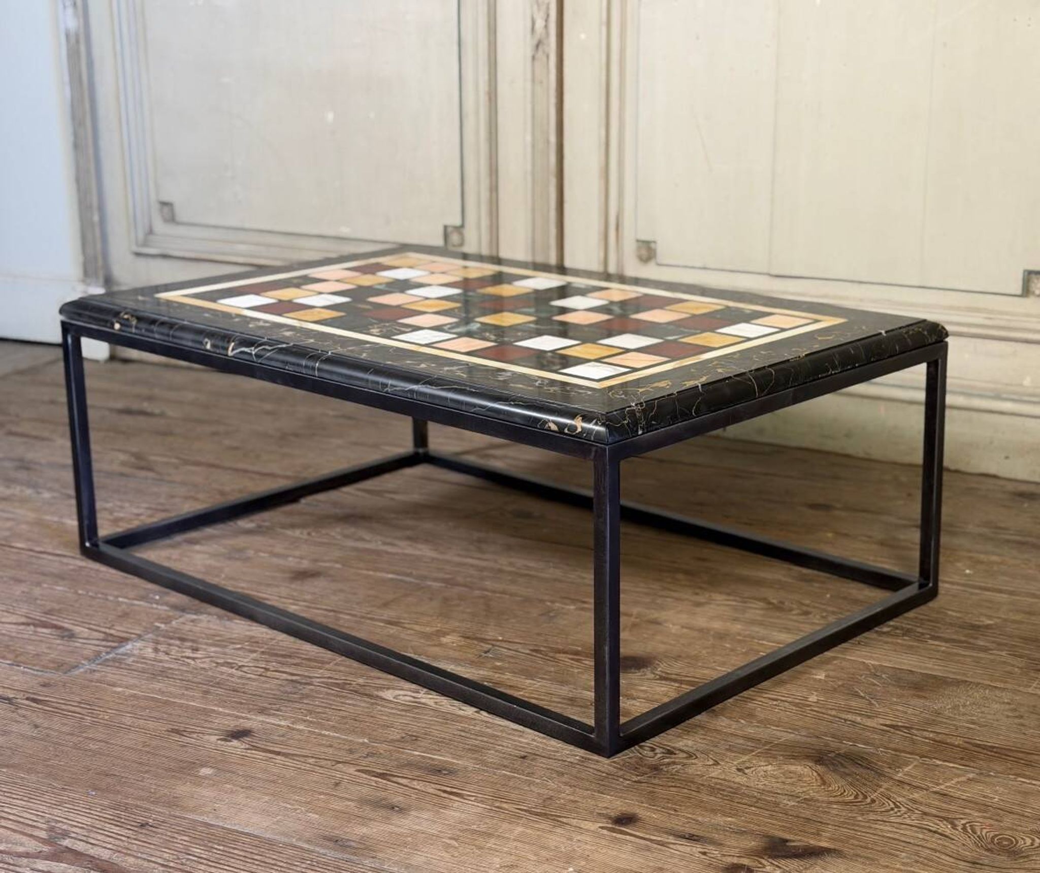 Coffee table, marble samples, custom metal base.