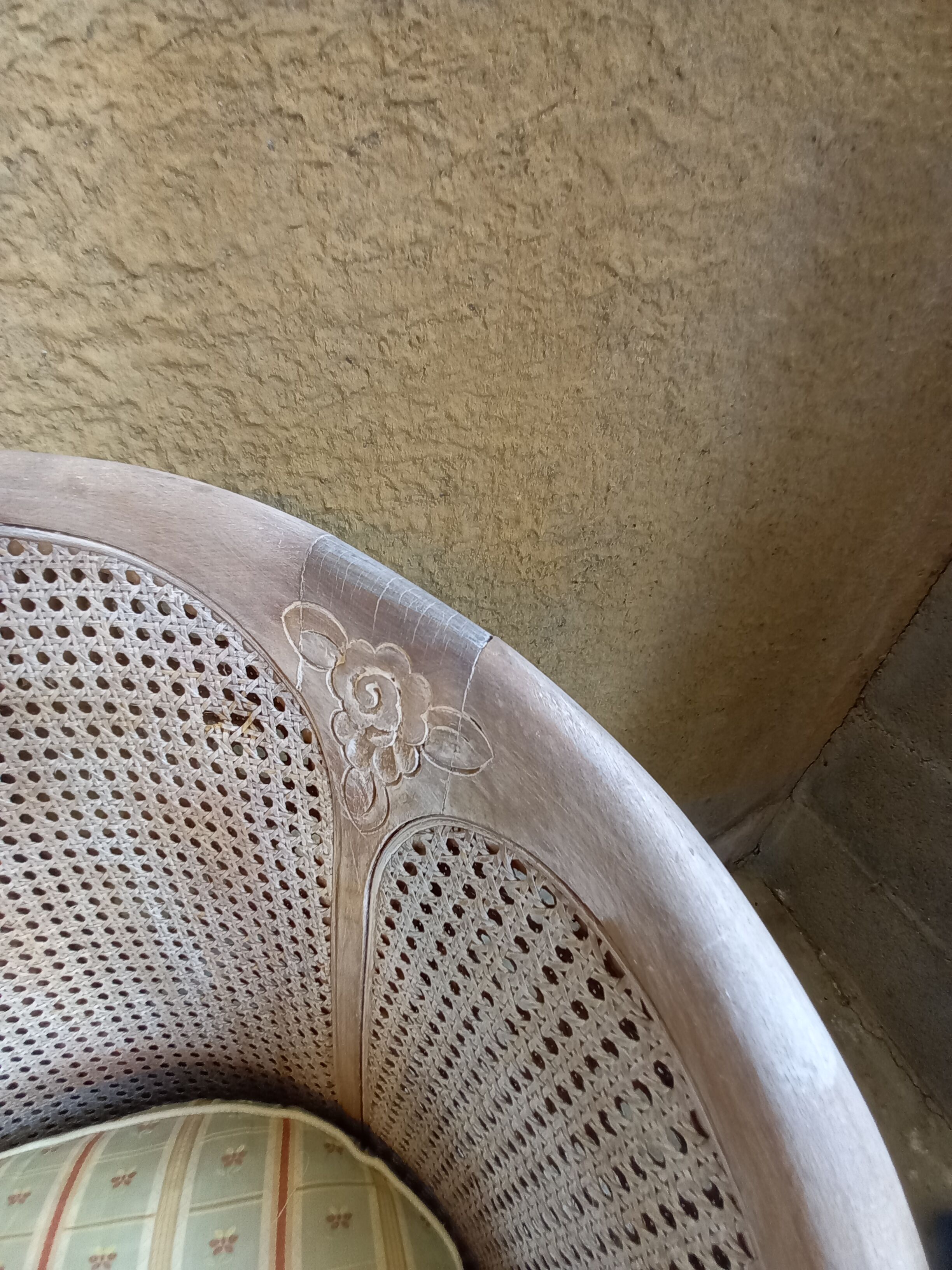 Canned basket armchair