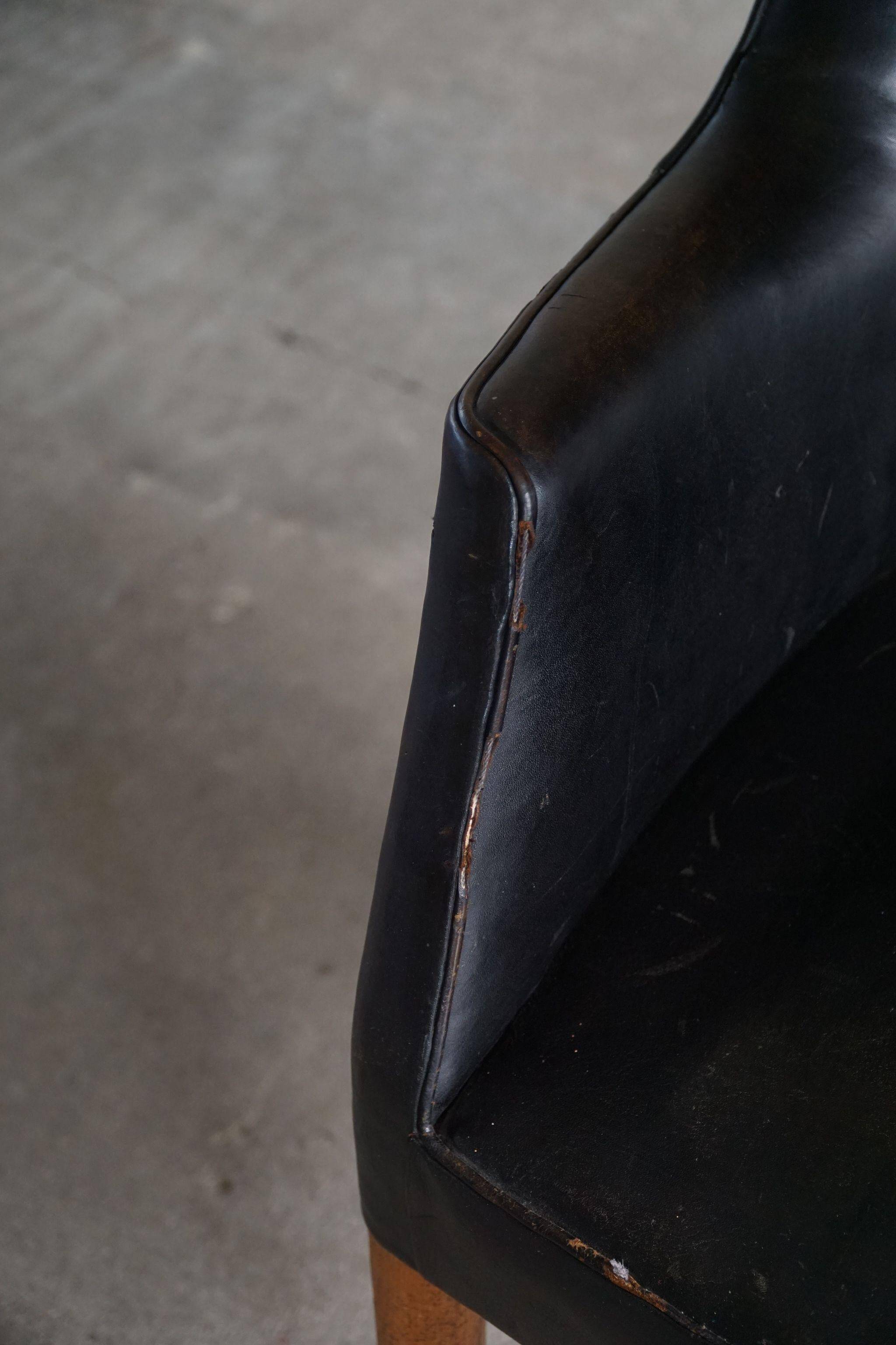 Fauteuil Danemark Moderne par Nanna Ditzel en chêne et cuir patiné, années 1950