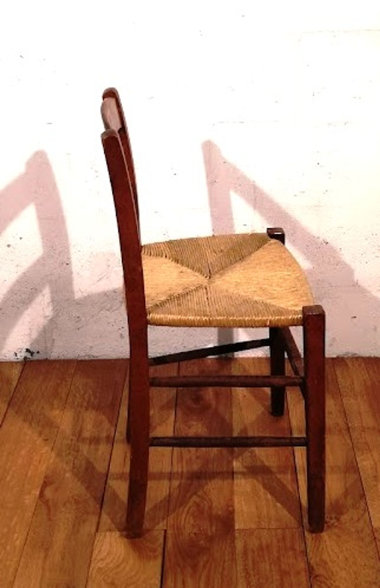 Vintage children's chair in wood and straw