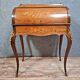 cylinder desk in Louis XV style, elegant and very decorative.
