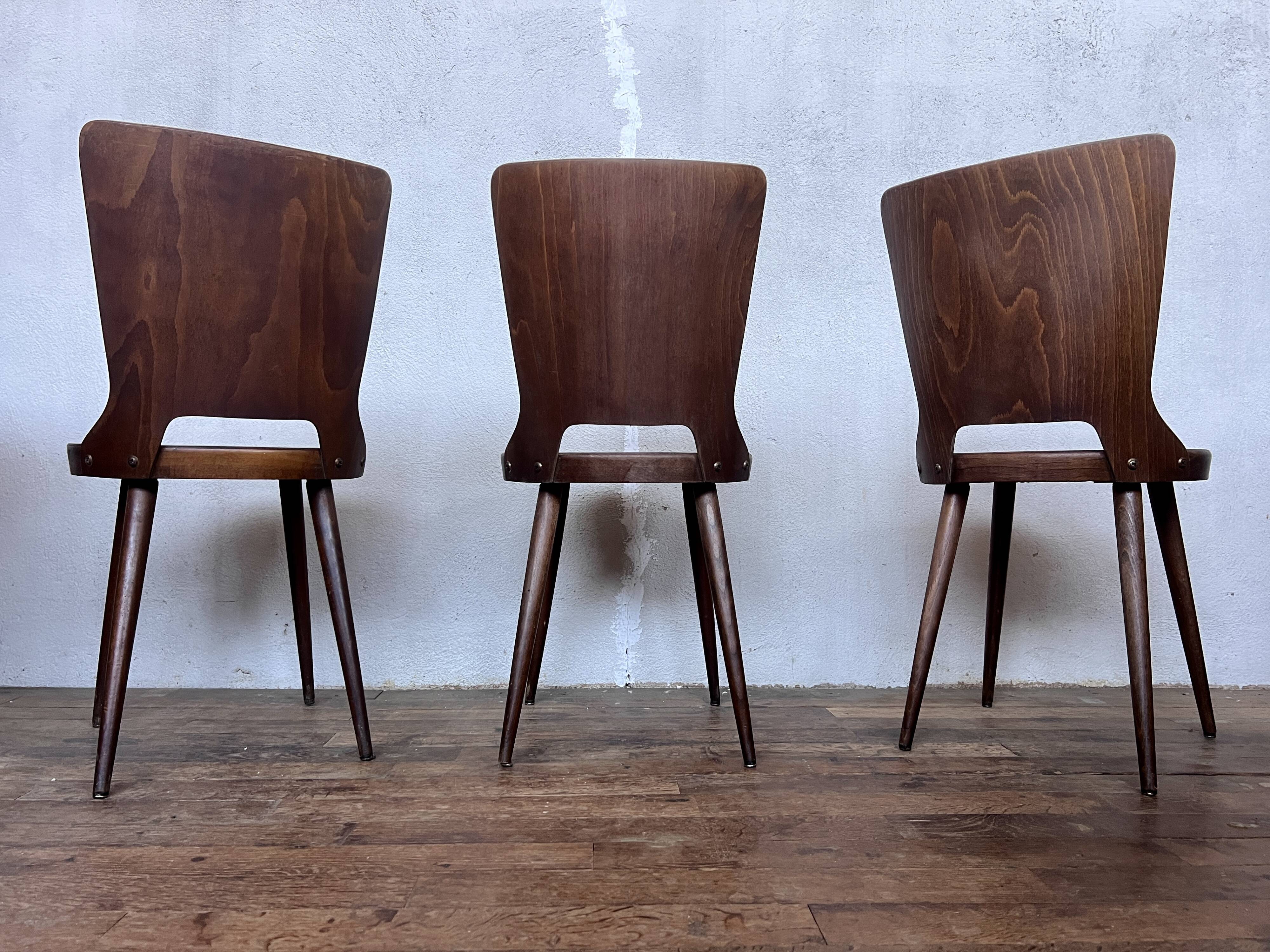 Trio of vintage retro Dove Baumann chairs 1960