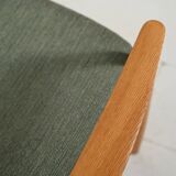 Scandinavian oak and sage-green wool armchair