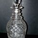 Richly cut crystal decanter and bevelled diamond engraved baccarat or saint-louis? trianon