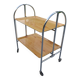 Folding dessert trolley on chrome metal wheels and formica.