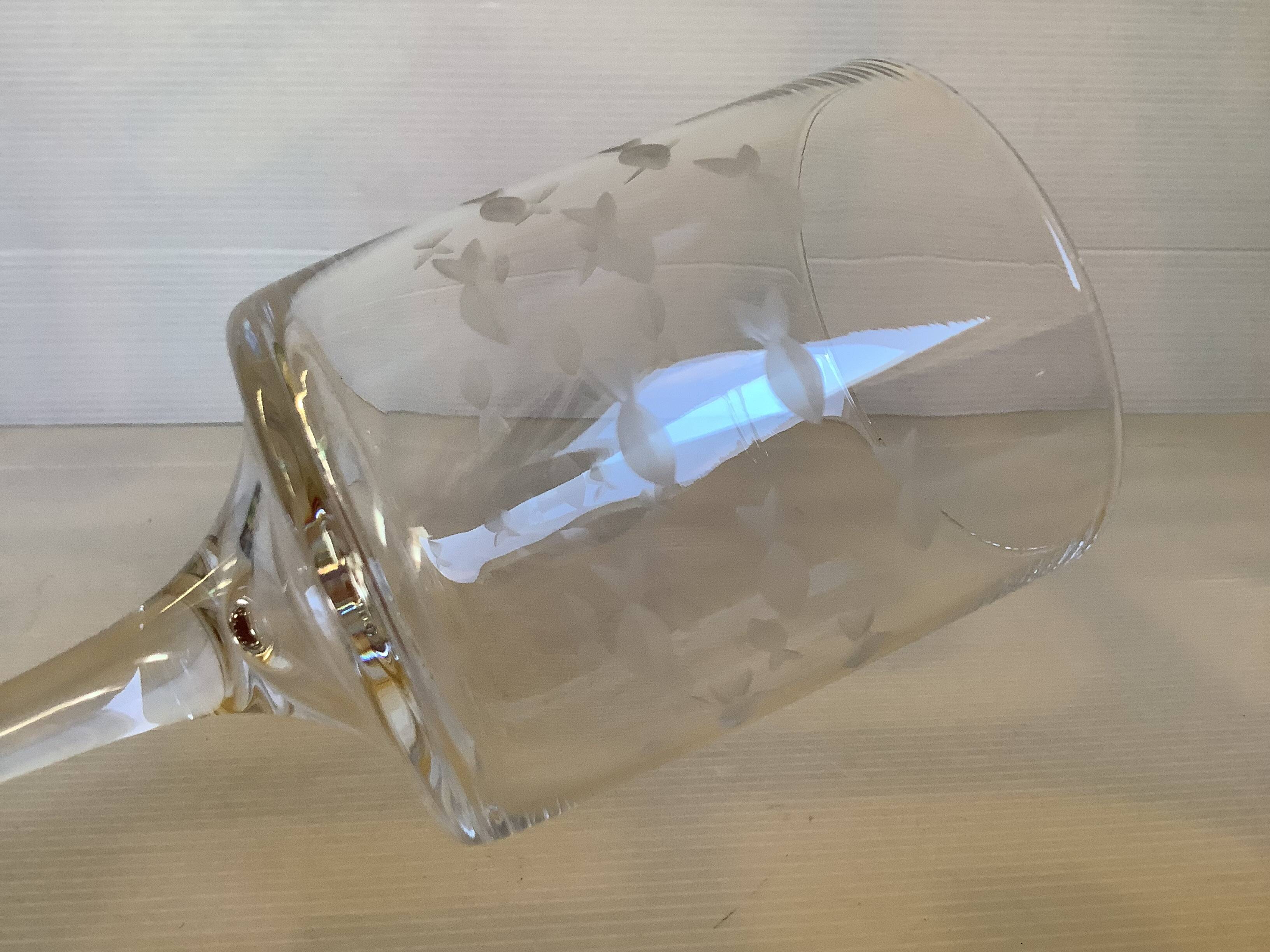 Duo of cut glass fish candle holders