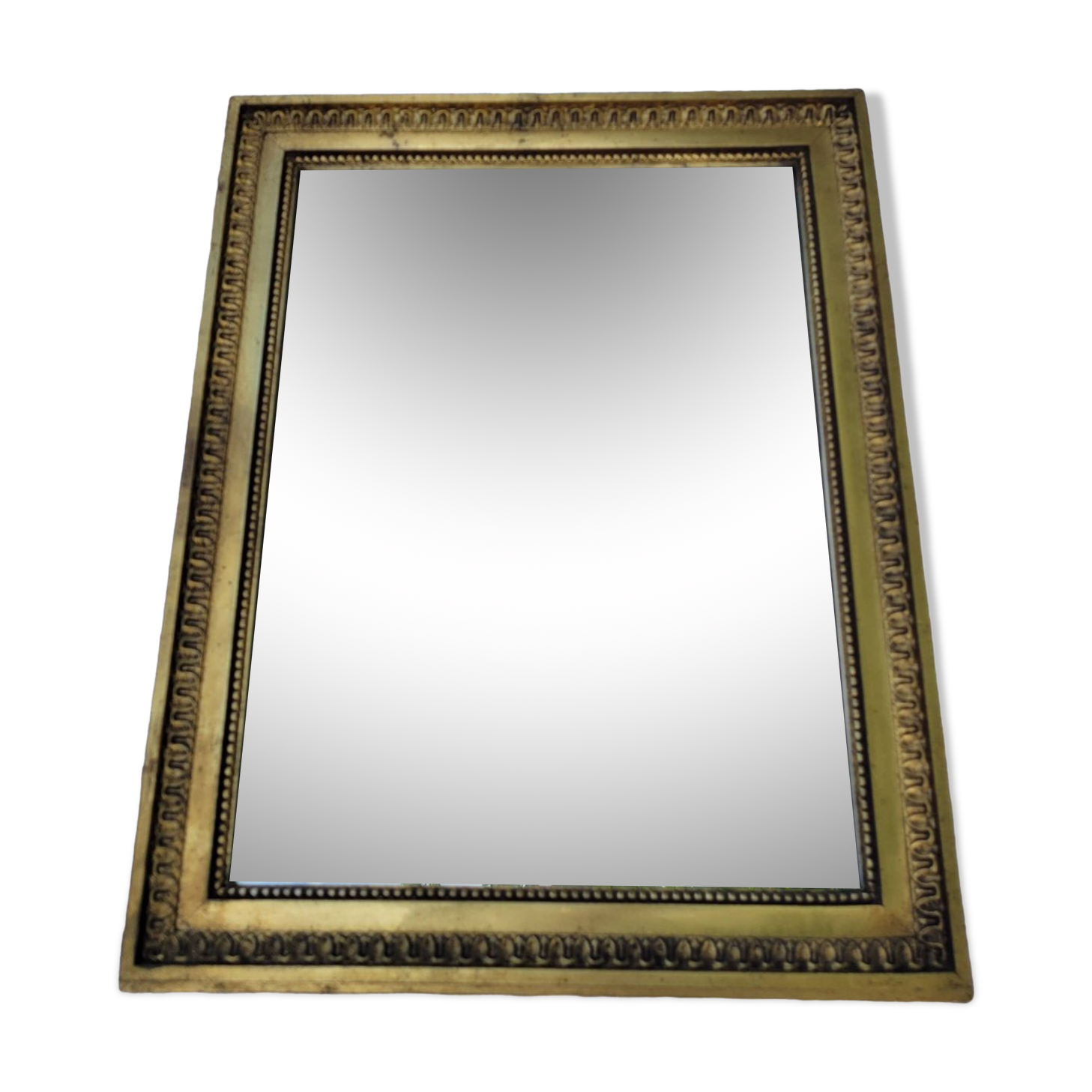 Old mirror in gilded wood