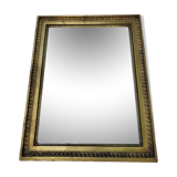 Old mirror in gilded wood
