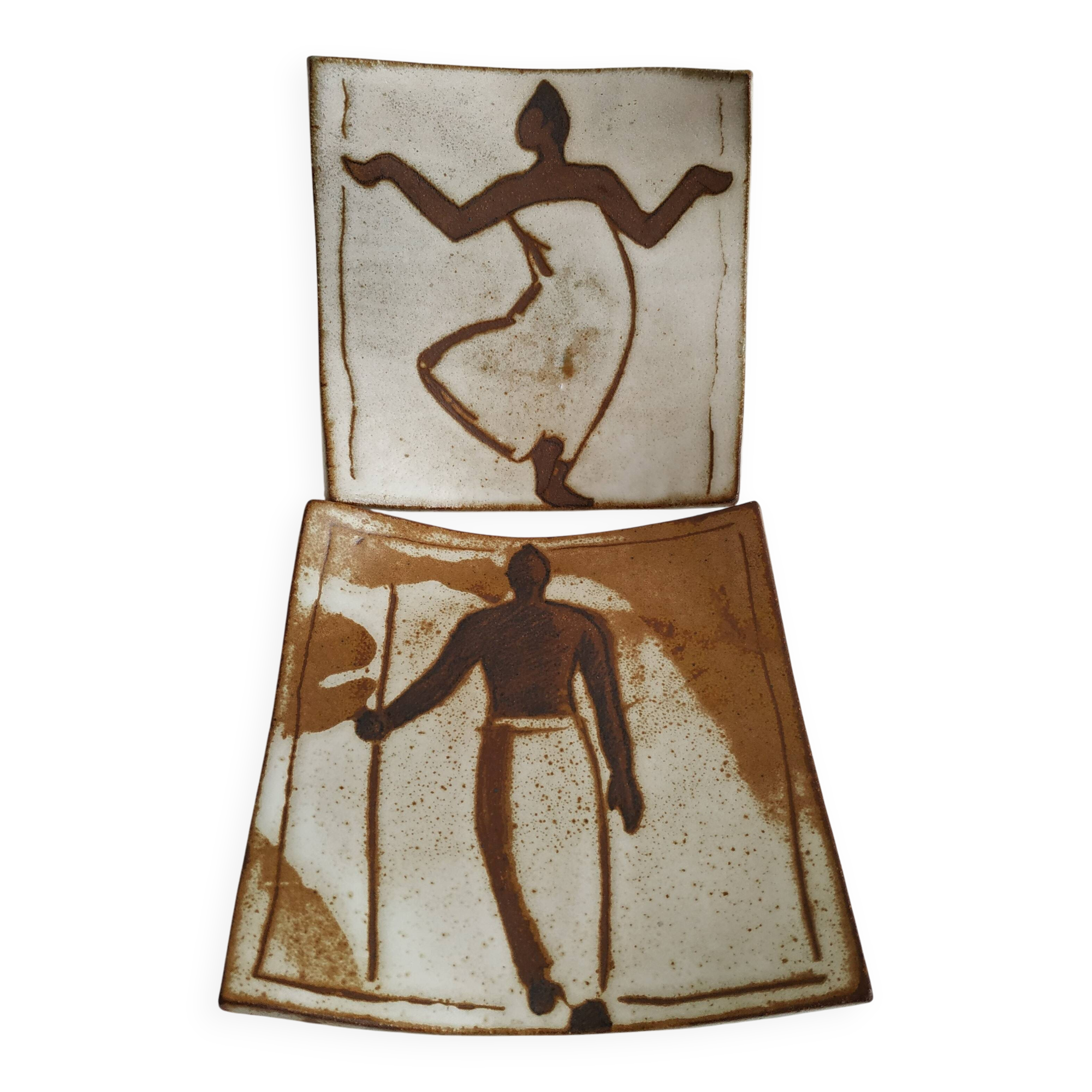 Two terracotta bowls with ethnic decoration and vintage signature.