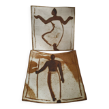 Two terracotta bowls with ethnic decoration and vintage signature.