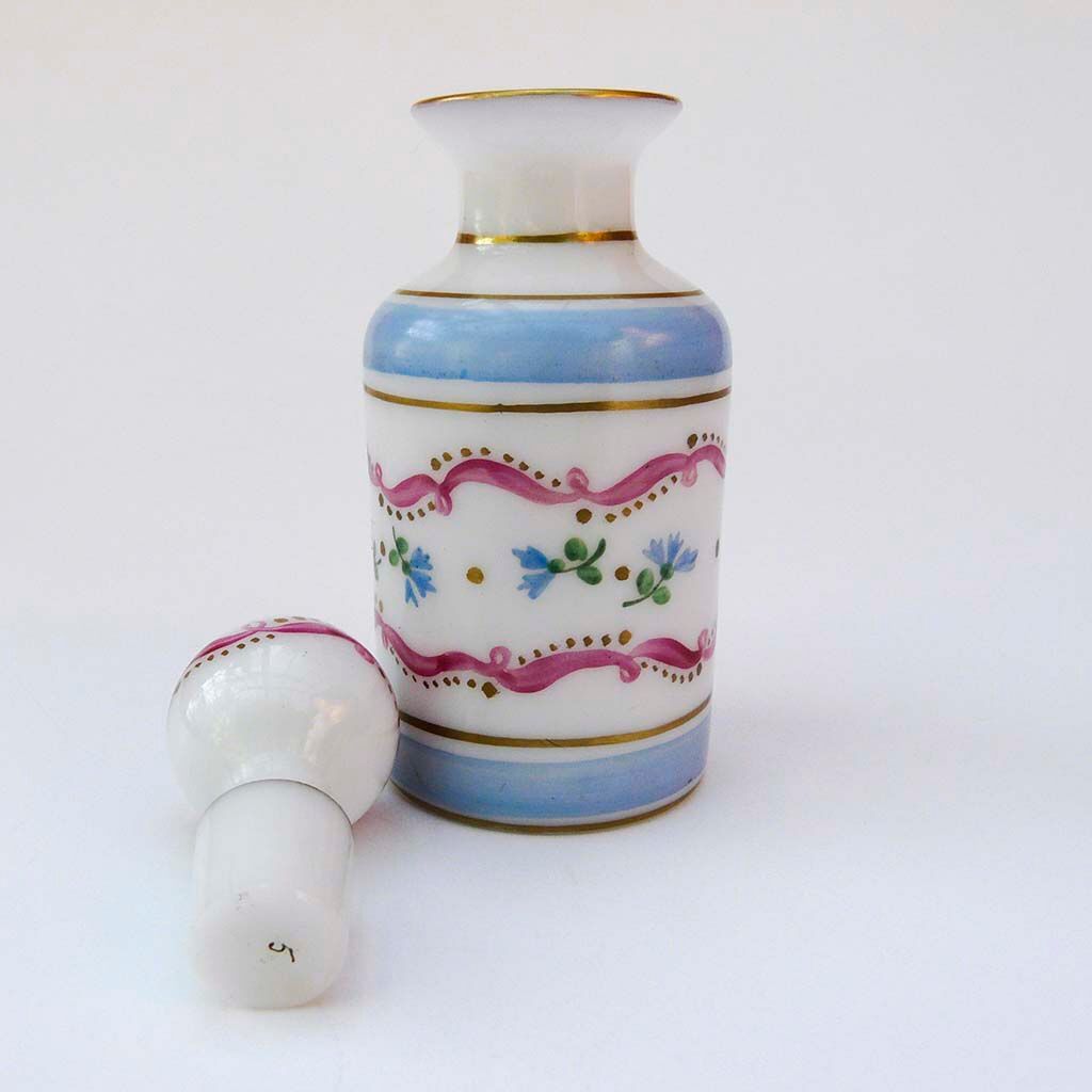 Bottle with floral decoration and antique gold edging